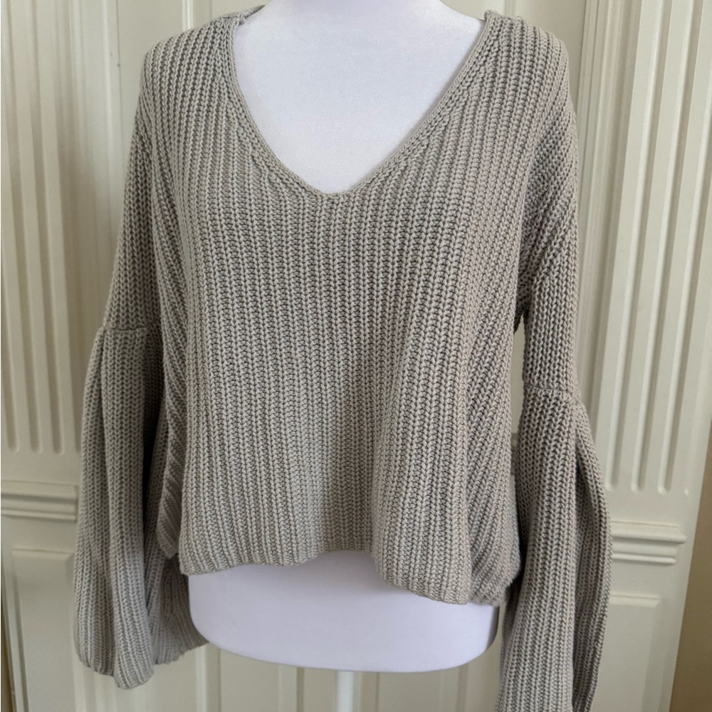 NWT. Brand new, never worn. Free People Grey V-Neck Sweater